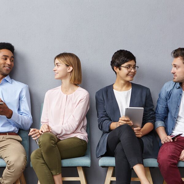 horizontal-portrait-of-people-sit-in-queue-have-pleasant-conversation-with-each-other-613748d005c81348998207.jpg